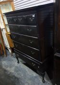 A late 19th/early 20th century tallboy with pediment above two short and four long drawers, to