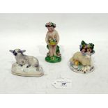 Staffordshire pottery model sheep with floral bocage, another pottery model sheep and a porcelain