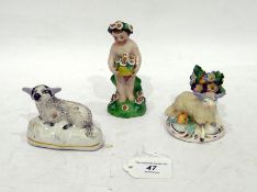 Staffordshire pottery model sheep with floral bocage, another pottery model sheep and a porcelain