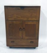 Light elm Ercol student's bureau, 82.5cm x 110cm