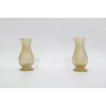 Amethyst glass bottle vase and pair of miniature verre eglomise baluster vases, footed and ribbed,