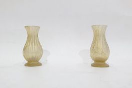 Amethyst glass bottle vase and pair of miniature verre eglomise baluster vases, footed and ribbed,