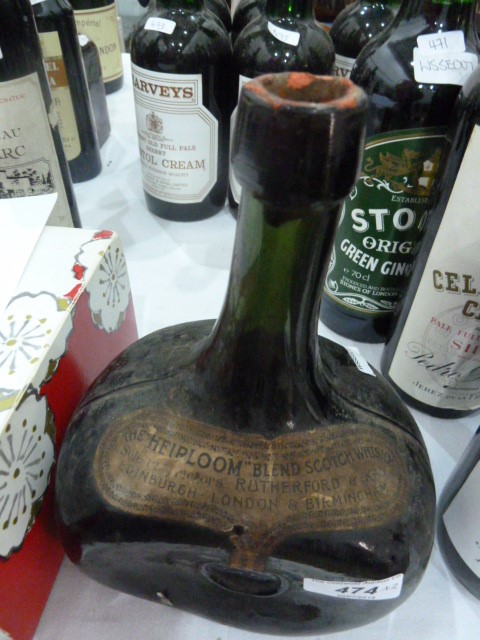 Antique bottle labelled "The Heirloom" blend scotch whiskey sole purveyors Rutherford and Kay - Image 5 of 5