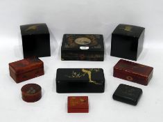 Pair square black laquer papiermache boxes, the lids decorated with cranes and a quantity of