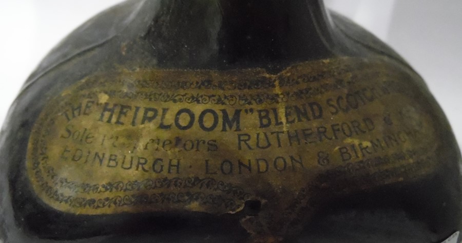 Antique bottle labelled "The Heirloom" blend scotch whiskey sole purveyors Rutherford and Kay - Image 3 of 5