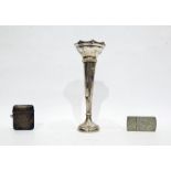 Birmingham silver vesta, a Birmingham silver stem vase and a white metal case with engraved