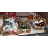Four boxes of assorted household items to include china, glass, vases, etc