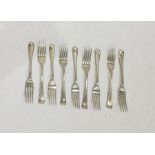Nine assorted London silver forks, various makers and dates, feather edged, 10 troy oz approx