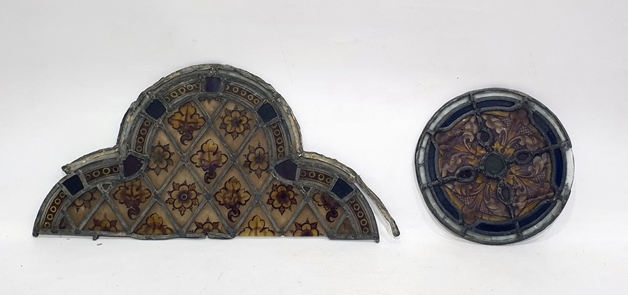Triple arched lead lined and stained glass window panel decorated flower heads within trelliswork 46