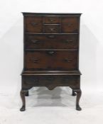 17th century oak tallboy with six assorted drawers, raised on a base of single drawer, to cabriole