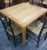 Modern oak extending dining table on square section tapering supports, 90cm x 90cm (unextended)