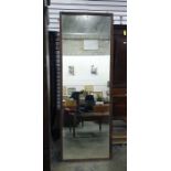 A large rectangular wall mirror with reeded frame, 67.5cm x 189cm