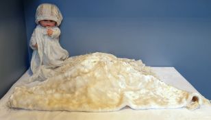 Chiltern doll with night gown and cap, and faux fur shawl