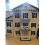 Lillyput doll's house, two-storey with extension and a large quantity of assorted interior fittings