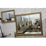 A 20th century rectangular wall mirror with moulded frame, 107cm x 128cm