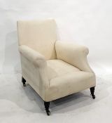 19th century deep-seated armchair on turned front legs to brass castors  Condition ReportThere is
