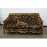 Late 19th/early 20th century gilt gesso three-piece suite viz:- three-seater settee with floral