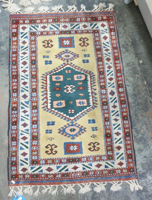 Persian style wool rug, yellow ground with central medallion