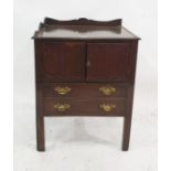 A 19th century mahogany commode with three-quarter galleried top above two cupboard doors, converted