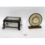 Gilt metal and cut glass small casket and a small dressing table clock with gilt metal having gilt