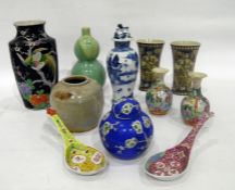 Group of Asian porcelain and stoneware, to include: a Chinese blue and white vase and a cover