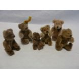 Steiff miniature teddy, seated 7cm high and five various jointed miniature gold plush teddies,