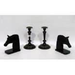 Pair of Art Deco black marble bookends in the form of horses' heads, each on rectangular plinth base