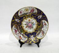 Late 18th/early 19th century porcelain plate centre painted with naturalistic floral bouquet, exotic