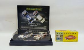 Scalextric Legends Cars set Ford Sierra vs BMW E30 together with a Vanguards 'VA38000 gypsy red