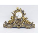 20th century ormolu mantel clock, the drum-shaped case with white enamel dial, inscribed "Martin