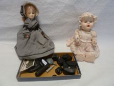 A 1950's plastic doll and a frontier woman Dan B's salute to the American woman together with a