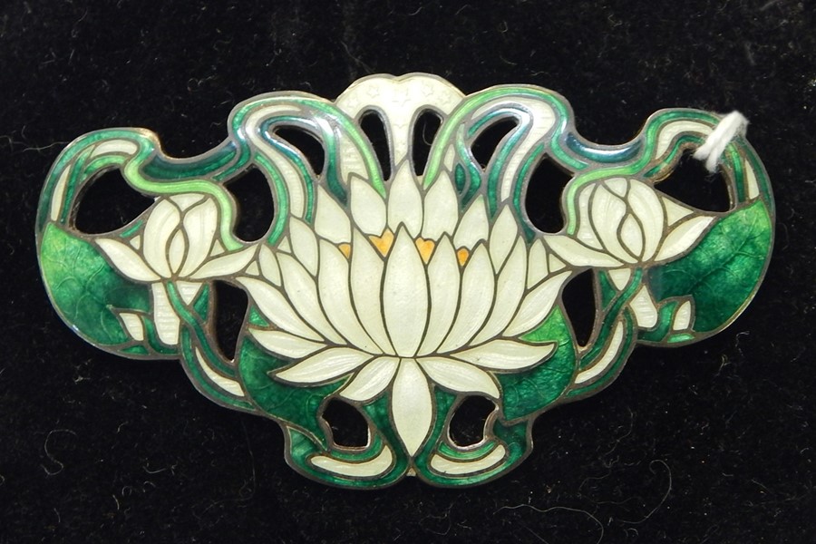 Art Nouveau sterling silver and enamel brooch, water lily to the centre, the enamel green and cream,