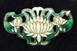 Art Nouveau sterling silver and enamel brooch, water lily to the centre, the enamel green and cream,