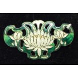 Art Nouveau sterling silver and enamel brooch, water lily to the centre, the enamel green and cream,