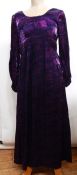 1960's maxi dress in a purple printed lame style material with elasticated cuffs to the sleeves