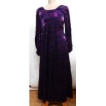 1960's maxi dress in a purple printed lame style material with elasticated cuffs to the sleeves