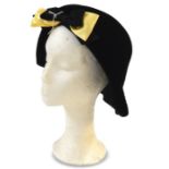 Marcelle George black velvet hat trimmed with yellow satin and black grosgrain bow, labelled '