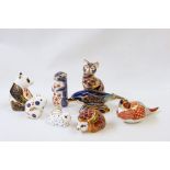 Eight Royal Crown Derby porcelain paperweights, Imari-pattern and similar, to include dolphin,