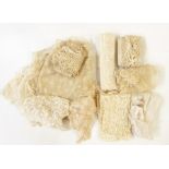 Quantity of assorted lace pieces including undyed, bobbin lace, etc (1 small box)
