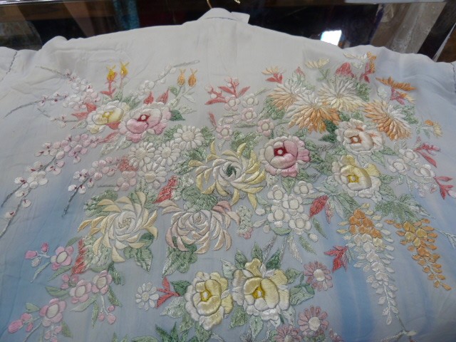 Silk kimono ,heavily embroidered with flowers, wisteria, etc, in pale blue silk; a nylon bed - Image 6 of 8