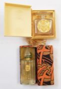 Violette de Parme bottle with frosted pointed panelled stopper in coral gilt and black Art Deco box,