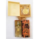 Violette de Parme bottle with frosted pointed panelled stopper in coral gilt and black Art Deco box,