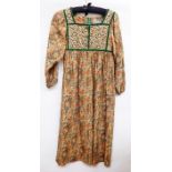 1970's  peasant dress, labelled Hildebrand - fabric by Liberty, bodice with green velvet trim and