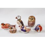 Collection of Royal Derby paperweights including goldfinch nesting, puffin and others in Imari-patte