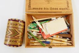 Assorted cocktail sticks, beaded purse, vintage tins, a small bakelite box designed as a suitcase