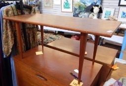 20th century teak coffee table with rectangular top, on tapering cylindrical supports, 93.5cm x 41cm