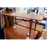 20th century teak coffee table with rectangular top, on tapering cylindrical supports, 93.5cm x 41cm