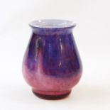 Probably Monart studio glass vase, purple and pink mottled, tapered and with flared rim, 13.5cm high