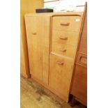 20th century G-Plan compactum in light oak, left hand wardrobe door and to the right three drawers