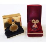 Elizabeth Taylor Diamonds and Rubies bottle, 6.5cm high, with stone set ribbon stopper in red velvet